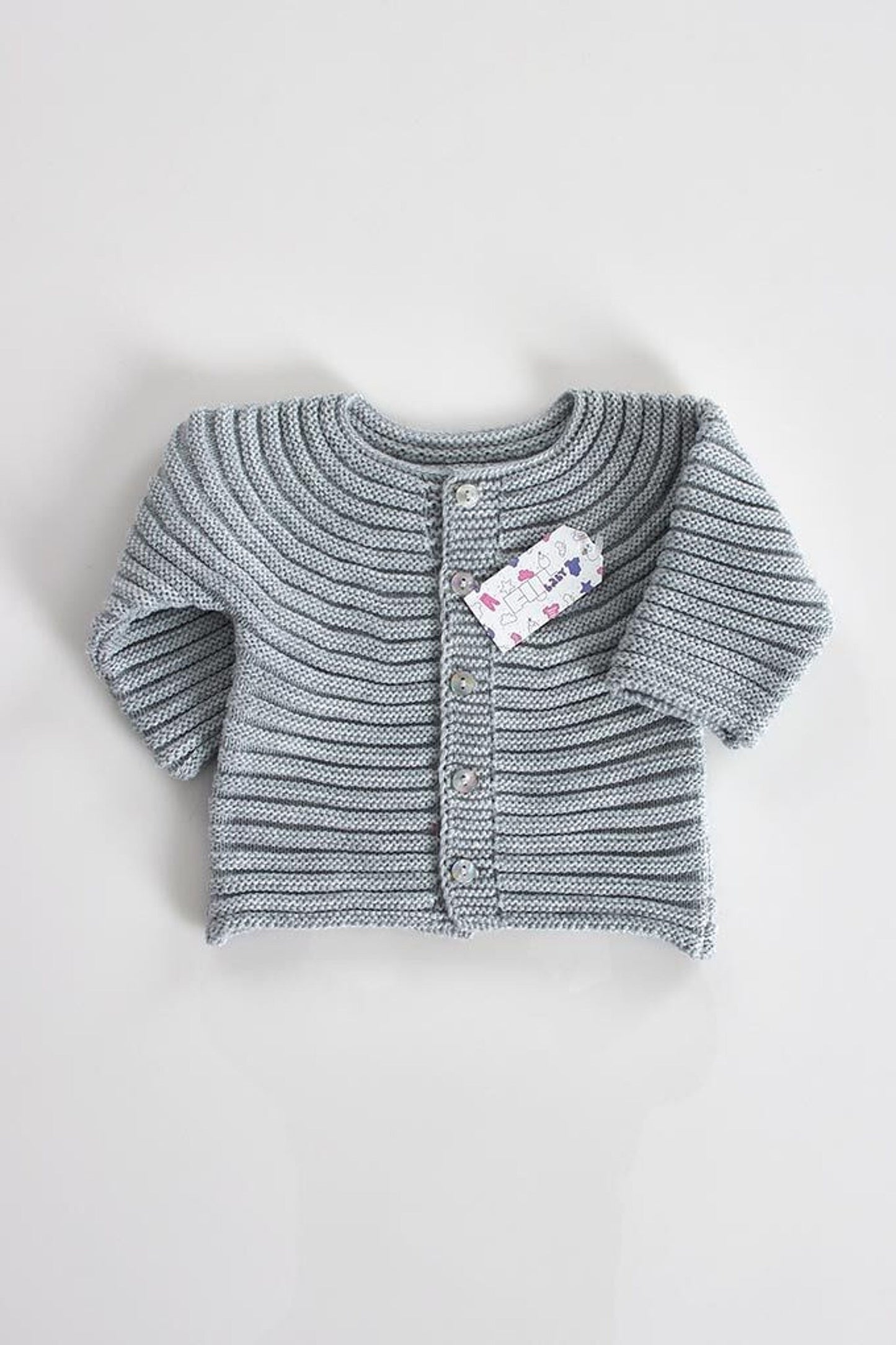 Kidbeste à motifs en tricot